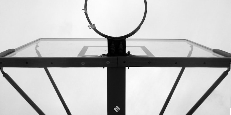 How does the goal buzzer technology work in Ice Hockey?